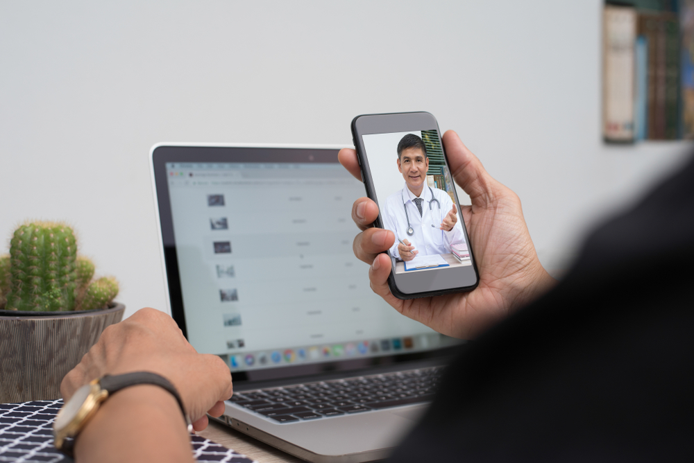 doctor on virtual call with a patient